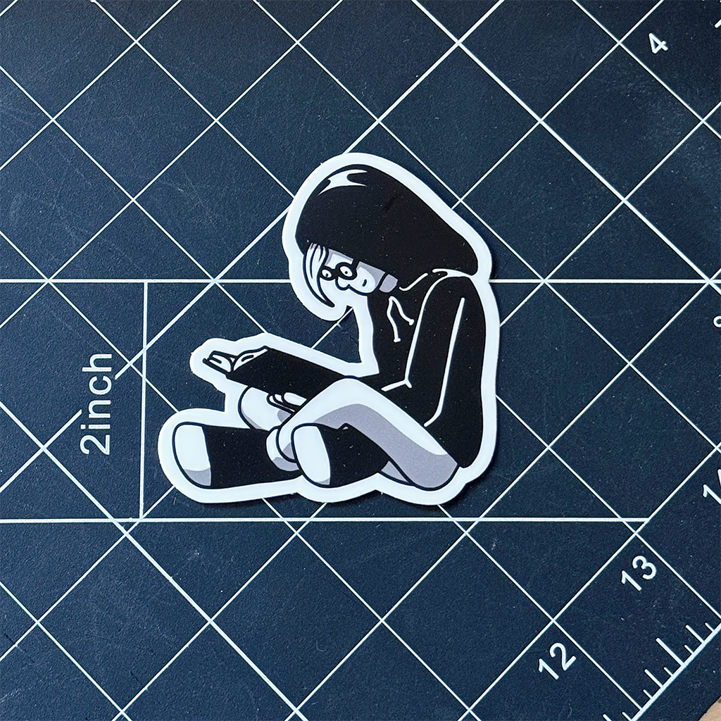 Girl Reading in Hoodie Vinyl Sticker Waterproof 2.9" X 3"