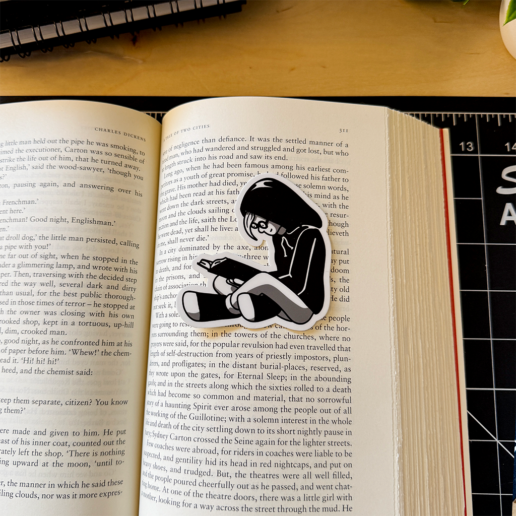 Girl Reading in Hoodie Vinyl Sticker Waterproof 2.9" X 3"
