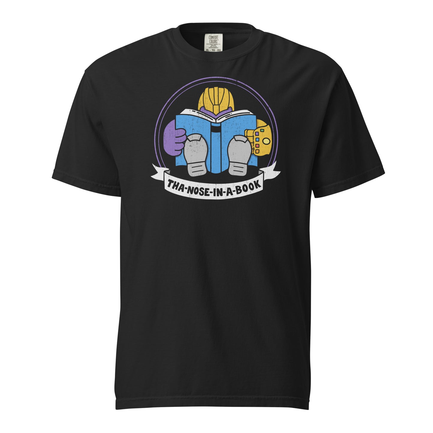 Black Comfort Colors t-shirt with a purple villain wearing a gold glove with gemstones. He is reading a blue book and the bottom banner reads "Tha-nose-in-a-book" as a parody.