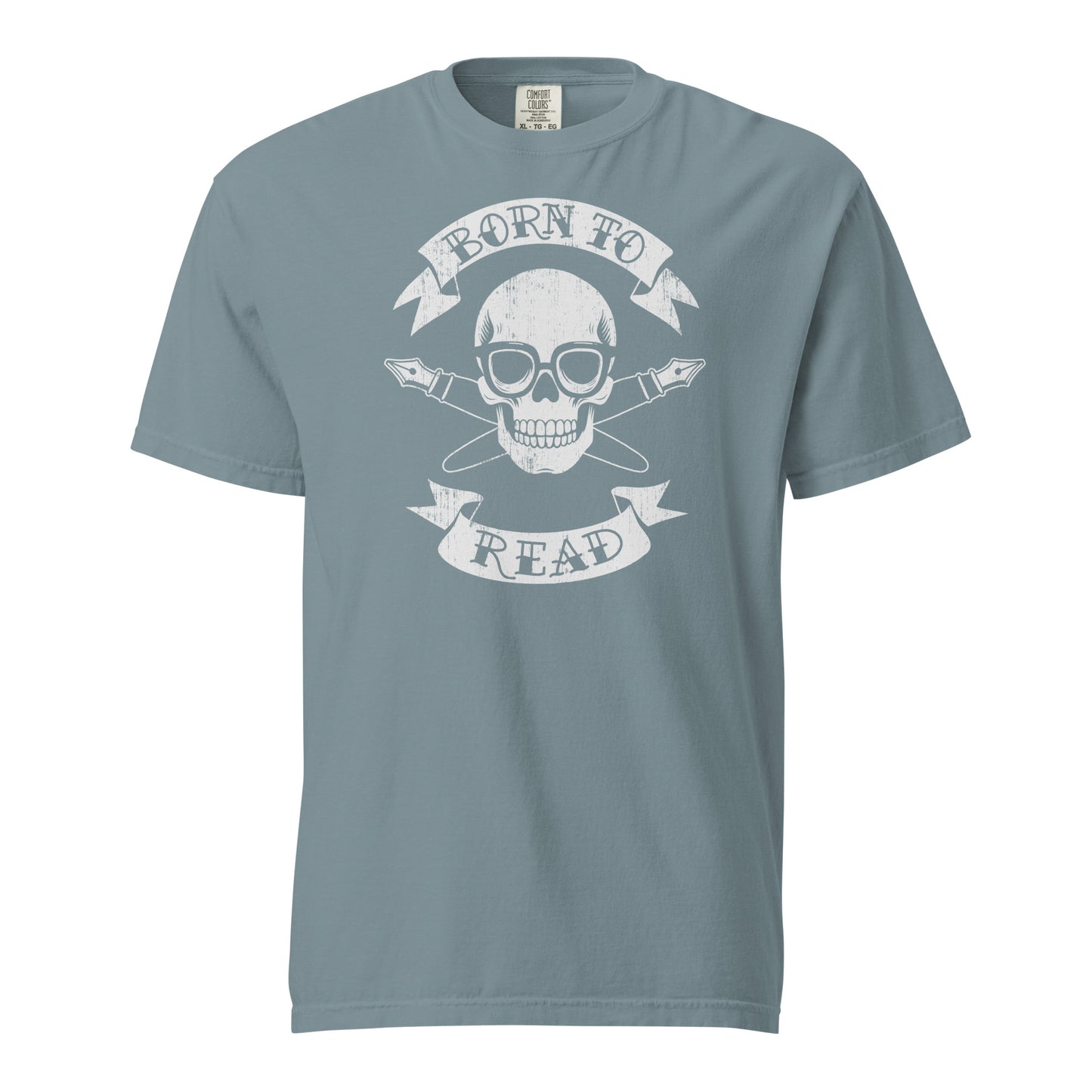 Ice Blue Comfort Colors T-shirt with a hand-drawn illustration of a skull and crossbones, except instead of crossbones, it has crossed pens and he's wearing nerdy glasses. The text is in a banner on top and bottom that reads "Born to Read"