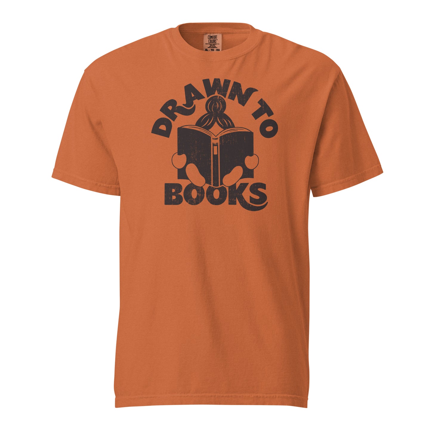 Yam Orange t-shirt with Drawn to Books logo, text says "Drawn to Books" which is framed around a girl reading a book, and you can see only the top of her ponytail, hands and feet, and the big book she's reading.