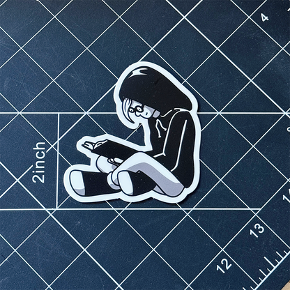 Girl Reading in Hoodie Vinyl Sticker Waterproof 2.9" X 3"