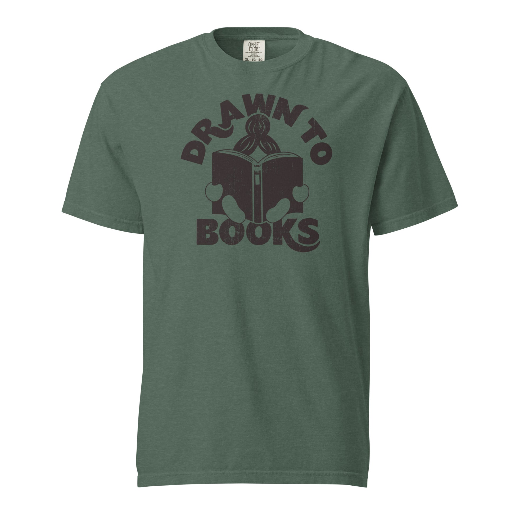 Blue Spruce Green t-shirt with Drawn to Books logo, text says "Drawn to Books" which is framed around a girl reading a book, and you can see only the top of her ponytail, hands and feet, and the big book she's reading.