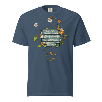Midnight Blue Comfort Colors T-shirt featuring all of Jane Austen's novels with teal covers and hand-type of each title, surrounded by a delicate floral design with white and orange flowers and green vines.